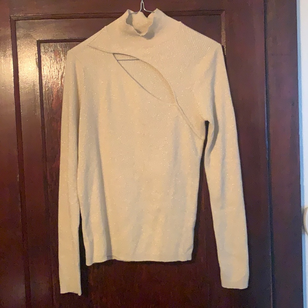 Light weight tan with gold fleck cut out high neck sweater.